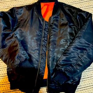 Black and orange reversible puffer jacket size small/medium vintage.